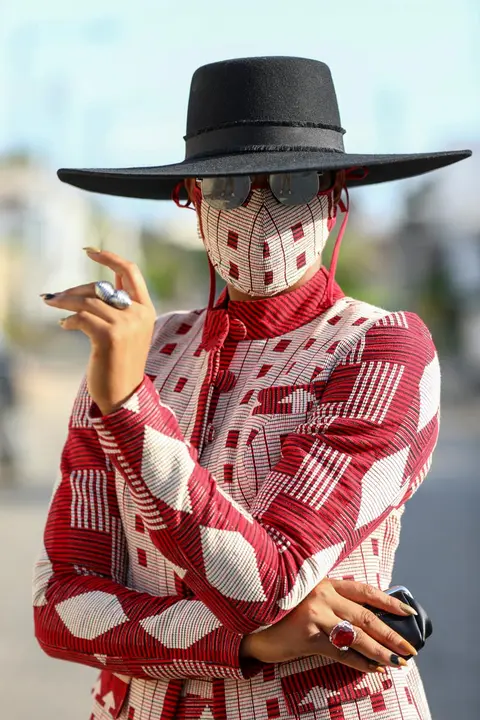 Nigerian style influencer Angel Obasi, 24, poses for a picture with a fabric face mask on, following the spread of the coronavirus disease (COVID-19) in Lagos, Nigeria May 14, 2020. REUTERS/Temilade Adelaja