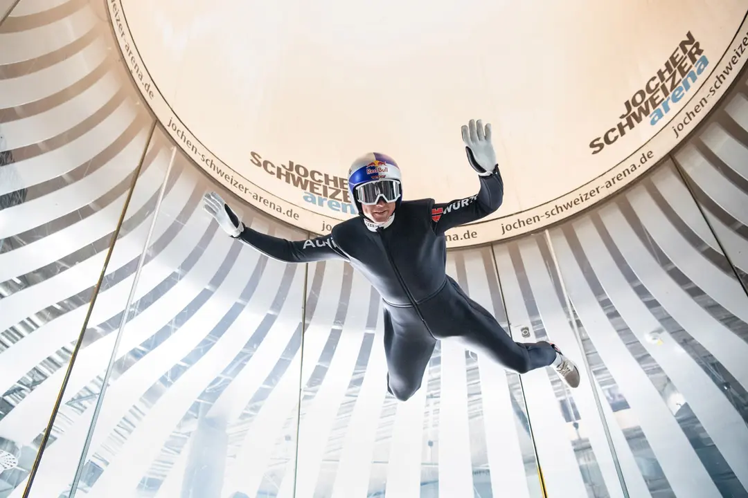 20 July 2020, Bavaria, Taufkirchen: German nordic combined skier of the national team in Nordic combination Vinzenz Geiger flies in the wind tunnel at a media event of the German Ski Association (DSV) at the Jochen Schweizer Arena. Photo: Matthias Balk/dpa.