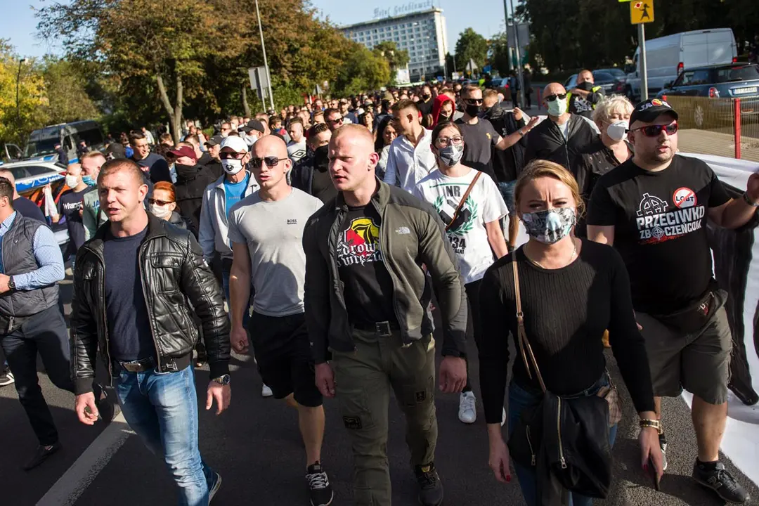 19 September 2020, Poland, Bialystok: People take part in a so-called March of Normality organized by the far right Polish party (National-Radical Camp) to support of what they describe as traditional family values and against the propaganda of deviation. Photo: Attila Husejnow/dpa.