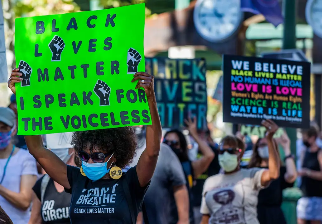 26 September 2020, US, Redlands: Protesters hold placards during &#34;Wake Up Redlands&#34; protest organized by NextGenUnited and University of Redlands Black Student Union to acknowledge and fight racism in Redlands. Photo: Terry Pierson/dpa.