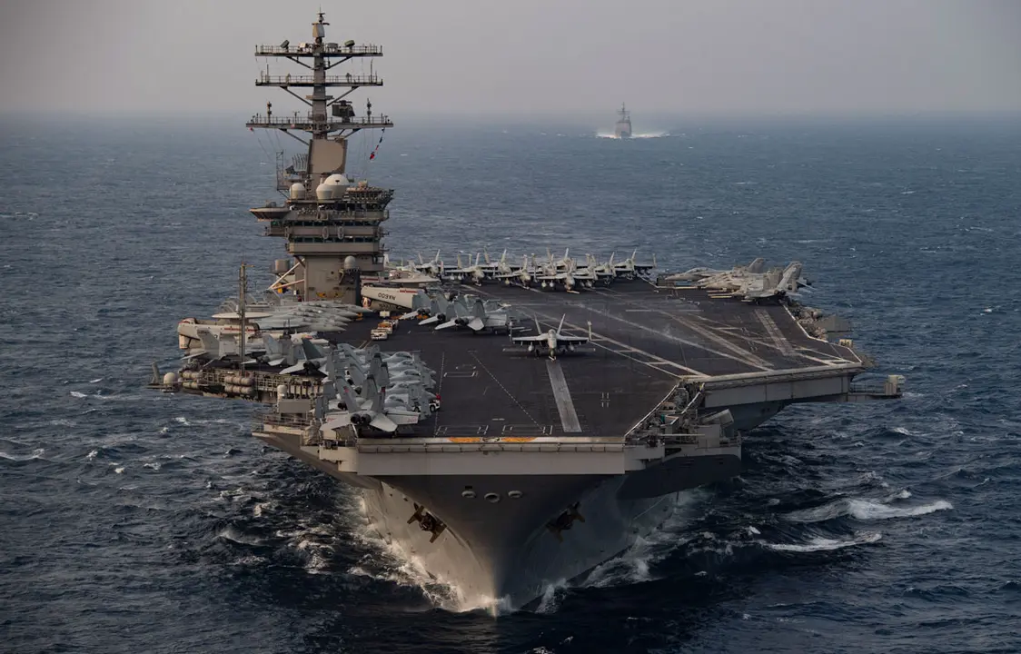 17 November 2020, ---: The aircraft carrier USS Nimitz (CVN 68) steams ahead of the guided-missile cruiser USS Princeton (CG 59) while participating in the second phase of Malabar exercise 2020 in the north Arabian Sea. Photo: -/U.S. Navy via ZUMA Wire/dpa