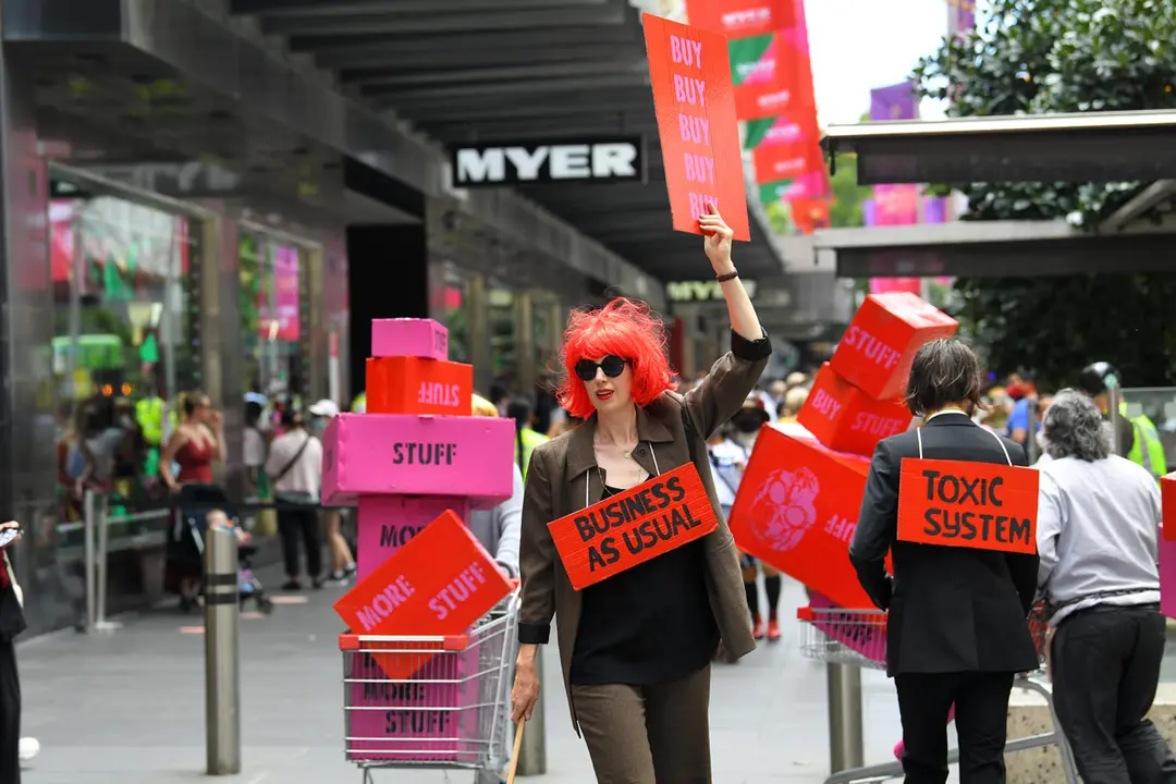 27 November 2020, Australia, Melbourne: Protesters take part in an Extinction Rebellion protest in Bourke Street Mall against Black Friday sales. Photo: James Ross/AAP/dpa.