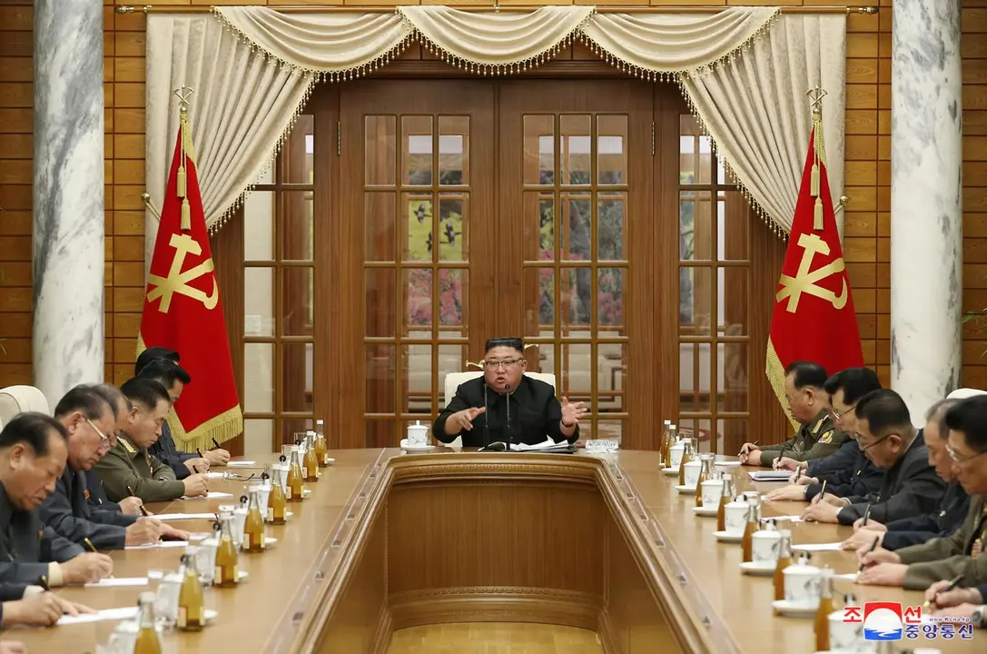 29 November 2020, North Korea, Pyongyang: A photo released by the official North Korean Central News Agency (KCNA) on 30 Novamber 2020 shows North Korean leader Kim Jong Un (C) attending an enlarged politburo meeting of the Workers' Party of Korea (WPK) to discuss preparation of a rare party congress scheduled to be held earlier next year. Photo: KCNA.