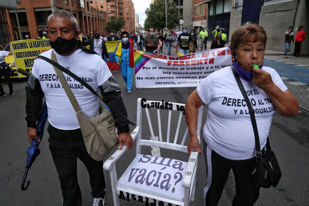 25 February 2021, Colombia, Bogota: Workers and bar owners take part in a protest to demand the reopening of the establishments which are closed due to the spread of the coronavirus pandemic. Photo: Camila D&iacute;az/colprensa/dpa