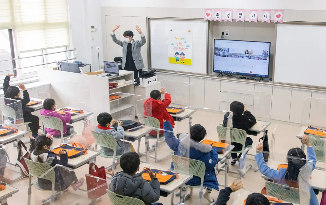 02 March 2021, South Korea, Seoul: Students attend an online entrance ceremony at a classroom of an elementary school in Seoul, as schools reopened nationwide amid the coronavirus pandemic. Photo: -/YNA/dpa