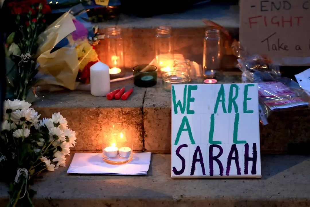 13 March 2021, United Kingdom, Leeds: Candles, messages and flowers left on the steps of the Parkinson Building at the University of Leeds in West Yorkshire, during a Reclaim These Streets vigil for Sarah Everard. Serving police constable Wayne Couzens, 48, was charged on Friday evening with kidnapping and killing the marketing executive, who went missing while walking home from a friend's flat in south London on 03 March 2021. Photo: Danny Lawson/PA Wire/dpa
