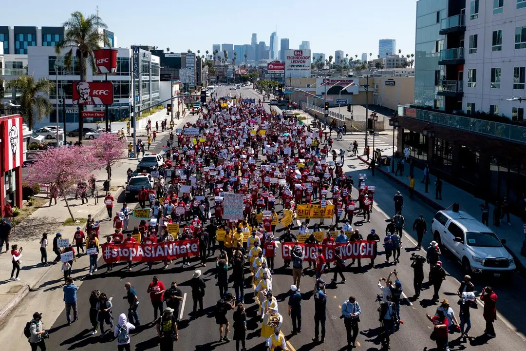 27 March 2021, US, Los Angeles: People take part in a "Stop Asian Hate" rally in Koreatown. Eight people, most of them of Asian descent, were killed and one injured in shootings at three massage parlours on 16 March 2021, in the north of the city of Atlanta in the US state of Georgia. Photo: Ringo Chiu/ZUMA Wire/dpa