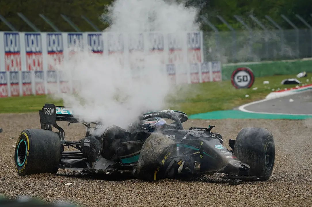 18 April 2021, Italy, Imola: Finnish Formula One driver Valtteri Bottas of team Mercedes-AMG Petronas sits inside his crumbled car after a crash with Britain's George Russell of team Williams during the Emilia Romagna Grand Prix race at the Autodromo Enzo e Dino Ferrari. Photo: Hasan Bratic/dpa