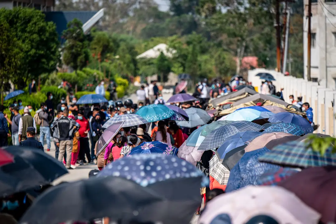 26 April 2021, Nepal, Kathmandu: People line up to get the first jab of Vero Cell Covid-19 vaccine, outside a health centre in Kathmandu. The Nepalese government has decided to vaccinate people aged between 40 and 59 years with the China-made Vero Cell Covid-19 vaccine. Photo: Dipendra Rokka/SOPA Images via ZUMA Wire/dpa