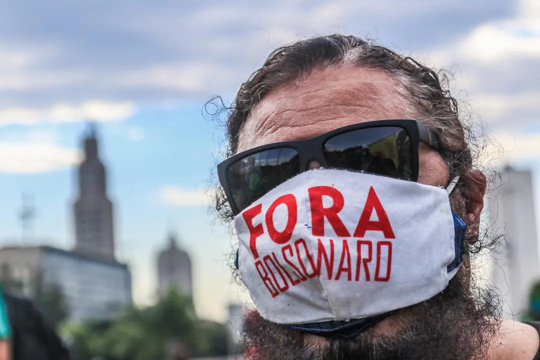 29 May 2021, Brazil, Rio de Janeiro: A protester takes part in a protest against the Brazilian President Jair Bolsonaro government. Photo: Ellan Lustosa/ZUMA Wire/dpa