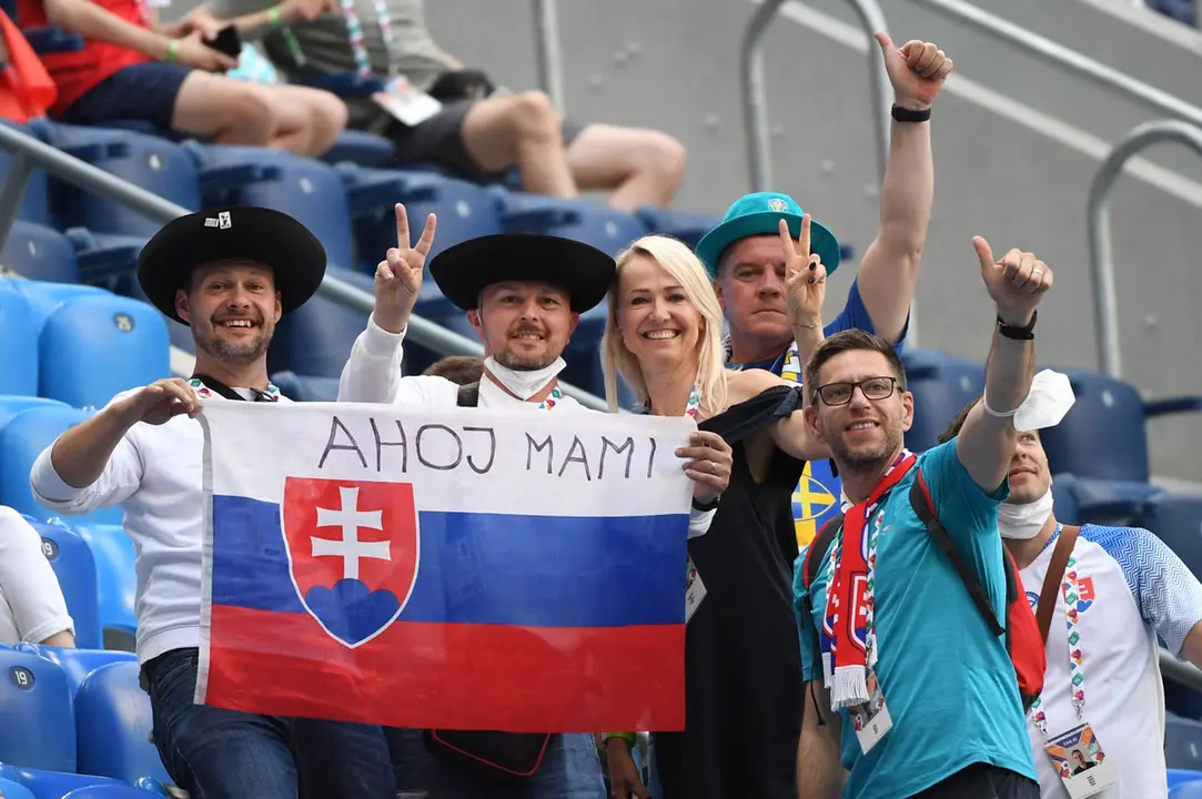 18 June 2021, Russia, Saint Petersburg: Slovakia fans cheer in the stands prior to the start of the UEFA Euro 2020 Group E soccer match between Sweden and Slovakia at the Krestovsky Stadium. Photo: Martin Baumann/TASR/dpa