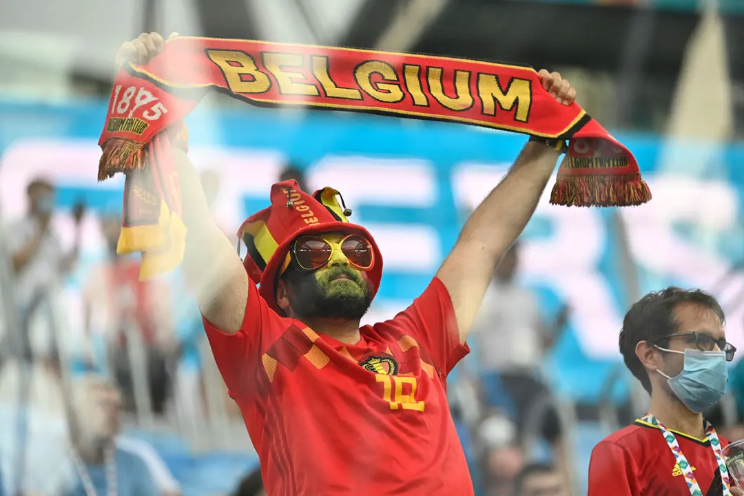 21 June 2021, Russia, Saint Petersburg: A Belgium supporter cheers in the stands prior to the start of the UEFA EURO 2020 Group B soccer match between Finland and Belgium at Saint Petersburg stadium. Photo: Dirk Waem/BELGA/dpa