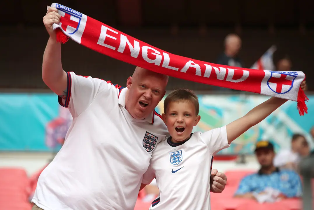 29 June 2021, United Kingdom, London: England fans cheer in the stands prior to the start of the UEFA EURO 2020 round of 16 soccer match between England and Germany at Wembley Stadium. Photo: Nick Potts/PA Wire/dpa