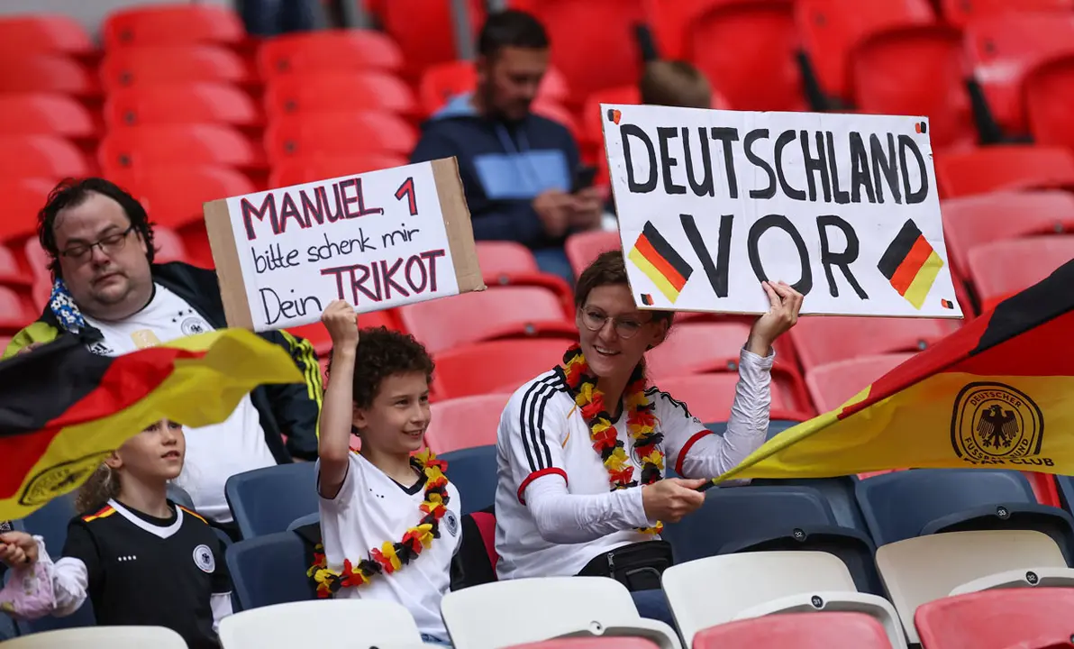 29 June 2021, United Kingdom, London: Germany fans cheer in the stands prior to the start of the UEFA EURO 2020 round of 16 soccer match between England and Germany at Wembley Stadium. Photo: Christian Charisius/dpa