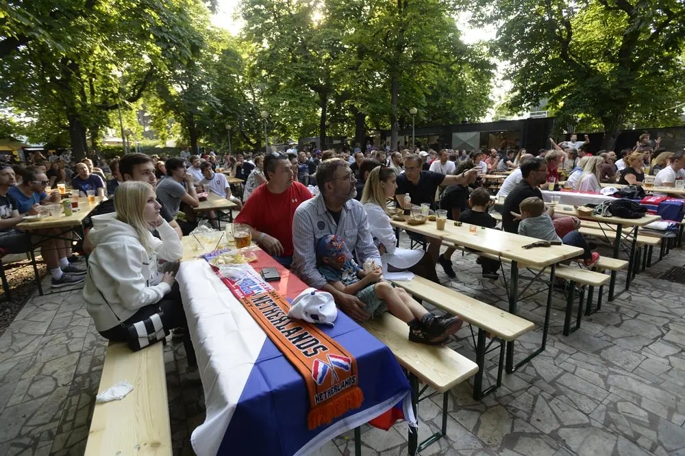 03 July 2021, Czech Republic, Prague: Fans watch the UEFA EURO 2020 Quarter-Final soccer match between Czech Republic and Denmark during a public screening for the match. Photo: ulová Kateøina/CTK/dpa