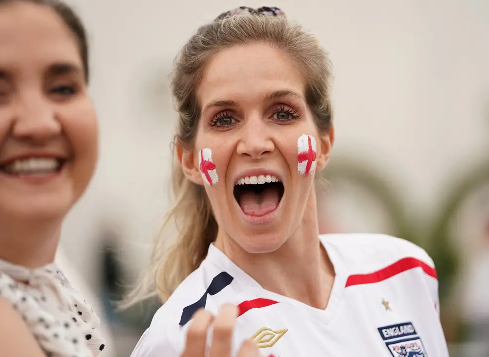 07 July 2021, United Kingdom, Manchester: England fans cheer ahead of the UEFA Euro 2020 semi-final soccer match between England and Denmark. Photo: Martin Rickett/PA Wire/dpa