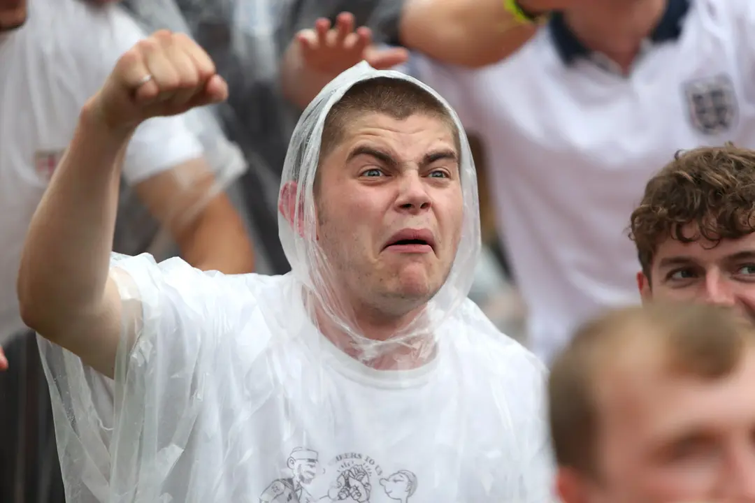 11 July 2021, United Kingdom, London: England fans gather at the Vinegar Yard to watch the UEFA EURO 2020 final soccer match between Italy and England during a public screening for the game. Photo: Kieran Cleeves/PA Wire/dpa