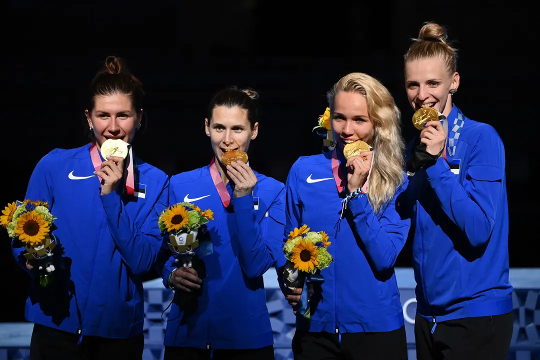 27 July 2021, Japan, Chiba: Gold medallist team Estonia celebrates on the podium during the medal ceremony of the Women's Epee Team events, at the Makuhari Messe B Red Piste, part of the Tokyo 2020 Olympic Games. Photo: Alfredo Falcone/LaPresse via ZUMA Press/dpa