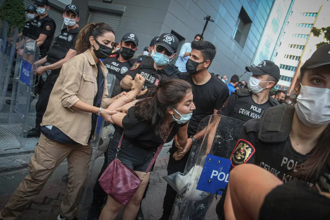 03 August 2021, Turkey, Ankara: Police officers arrest a protester during a demonstration following the death of the 21-year-old university student Azra Gülendam who was found in a forest area in Antalya Kepez. Photo: Tunahan Turhan/SOPA Images via ZUMA Press Wire/dpa