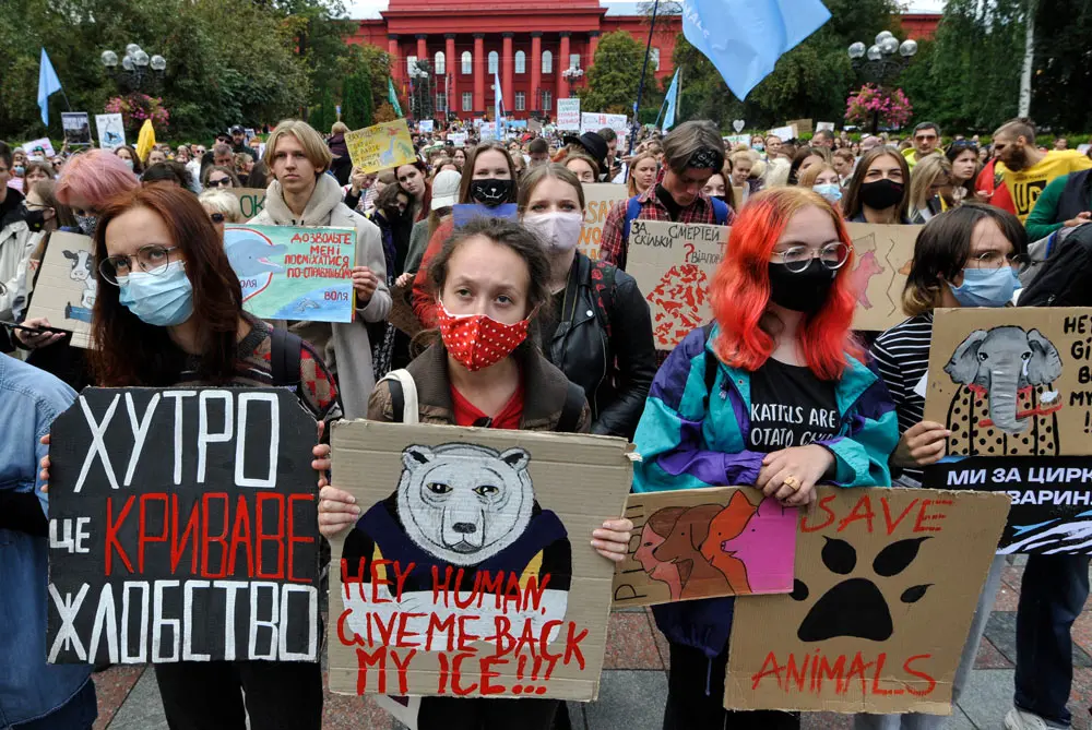 05 September 2021, Ukraine, Kiev: Animal protection activists hold placards during a rally for animal rights under the slogan 'Protecting the weak is the business of the strong'. Photo: Sergei Chuzavkov/SOPA Images via ZUMA Press Wire/dpa