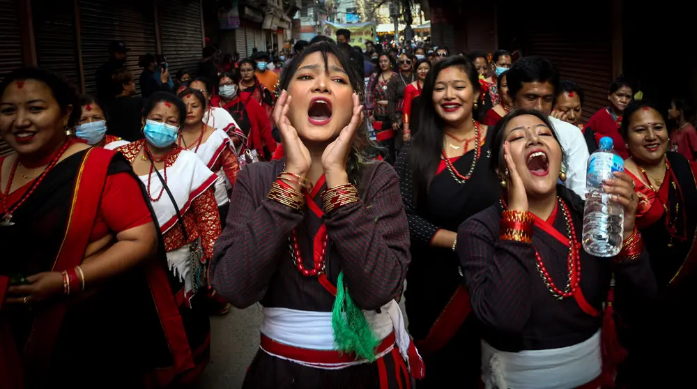 05 November 2021, Nepal, Kathmandu: Women from ethnic Newar community take part in a cultural rally in celebration of the New Year 1142 of Nepal Sambat. Nepal Sambat, founded by Shankhadhar Sakhwa, is a national lunar calendar of Nepal which begins every year on 'Mha Puja', the fourth day of Tihar festival. Photo: Sunil Sharma/ZUMA Press Wire/dpa.