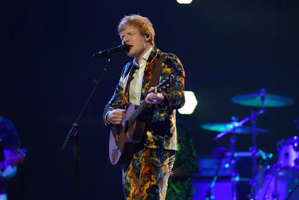 14 November 2021, Hungary, Budapest: English singer Ed Sheeran performs during the 2021 MTV Europe Music Awards (EMAs) at the Papp Laszlo Budapest Sportarena. Photo: Ian West/PA Wire/dpa.