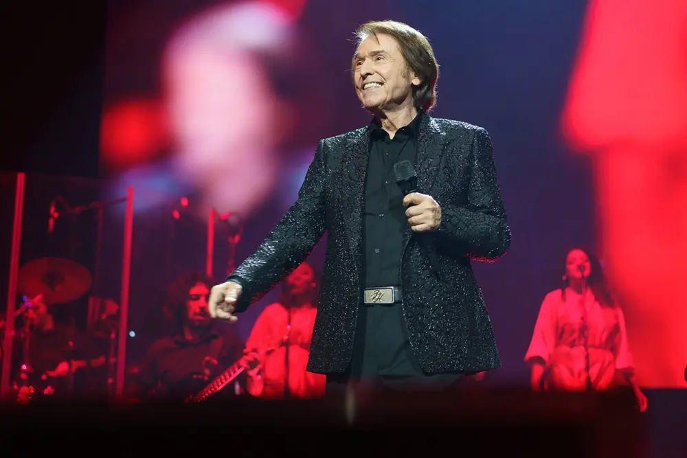 16 December 2021, Spain, Madrid: Spanish singer Raphael performs on stage during a concert at Wizink Centre to celebrate 60 years of his musical career. Raphael, one of the most nationally and internationally renowned Spanish artists. Photo: Atilano Garcia/SOPA Images via ZUMA Press Wire/dpa.