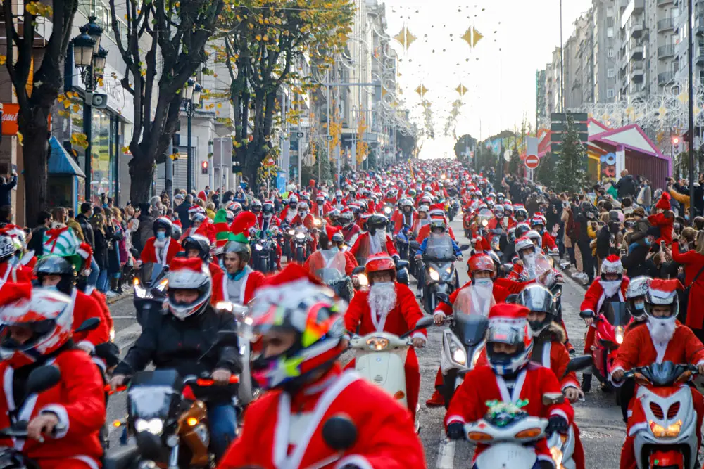 FILED - 18 December 2021, Spain, Vigo: A group of bikers dressed as Santa Claus tour the city during the eleventh edition of the Papanoelada biker, organized by Moto Club Galicia. Photo: Marta Vázquez Rodríguez/EUROPA PRESS/dpa.