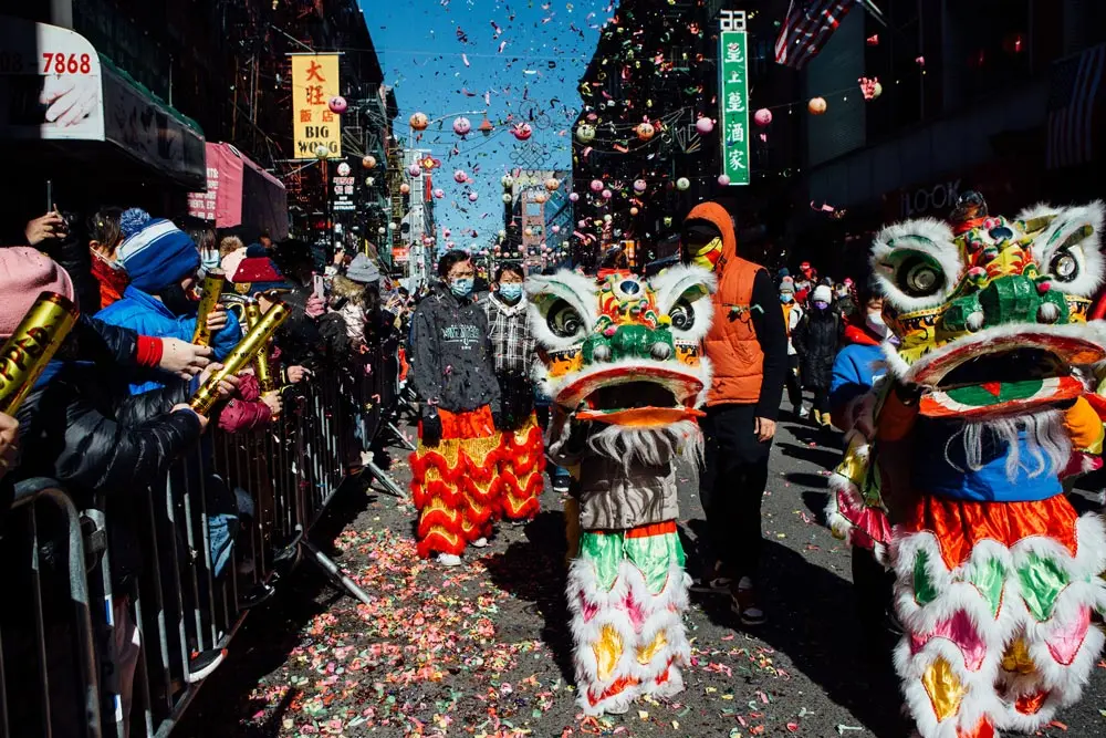 20 February 2022, US, New York: People attend the 24th Annual Chinatown Lunar New Year parade in New York City. 2022 marks the Year of the Tiger. Photo: Syed Yaqeen/ZUMA Press Wire/dpa.