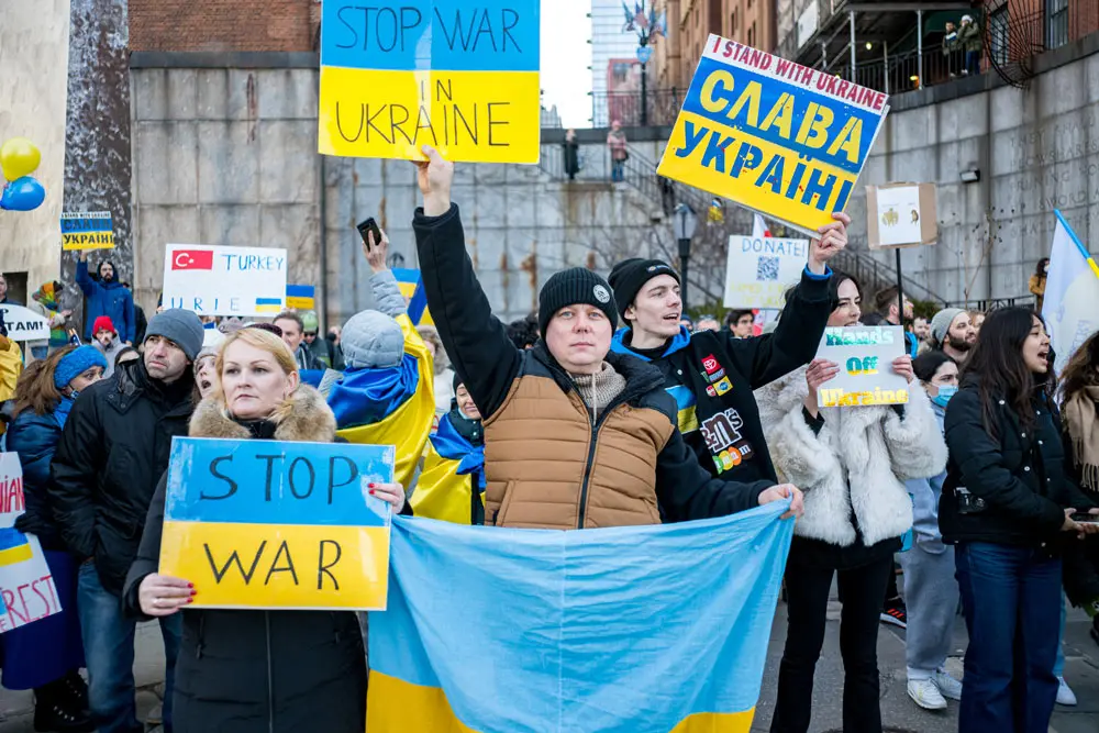 27 February 2022, US, New York: Protesters hold placards during a protest against the Russian invasion of Ukraine at the Consulate General of the Russian Federation in New York. Photo: Brian Branch Price/ZUMA Press Wire/dpa.