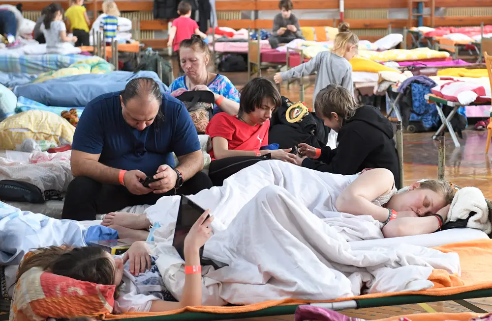 10 March 2022, Slovakia, Kosice: Refugees from Ukraine stay at the gymnasium of the Secondary Vocational School of Beauty Services at Gemerska Street in Kosice. Photo: Frantiöek Iv·n/TASR/dpa.