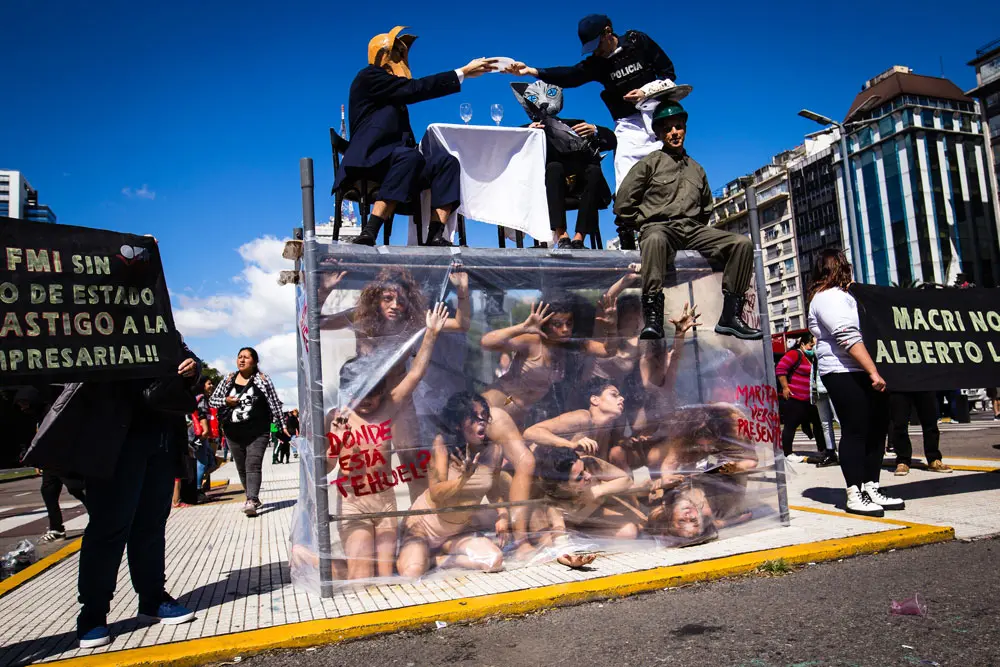 24 March 2022, Argentina, Buenos Aires: A group of artists perform a choreography, about the disappeared persons during the last military dictatorship between 1976 and 1983, while taking part in a protest on the Day of Remembrance for Truth and Justice. Photo: Nacho Boullosa/SOPA Images via ZUMA Press Wire/dpa.