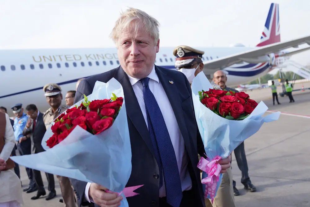 21 April 2022, India, Ahmedabad: UK Prime Minister Boris Johnson arrives at Sardar Vallabhbhai Patel International Airport in Ahmedabad as he begins a two-day visit to India. Photo: Stefan Rousseau/PA Wire/dpa.