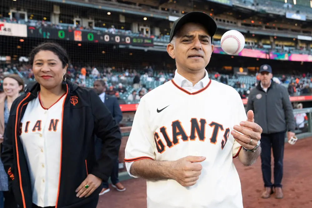 10 May 2022, US, San Franciso: Mayor of London Sadiq Khan (R) and Mayor of San Francisco London Breed arrive for the San Francisco Giants and Colorado Rockies baseball game at Oracle Park before pitching the first ball to start the game, during his fi ve-day visit to the US in a bid to boost London's tourism industry. Photo: Stefan Rousseau/PA Wire/dpa.