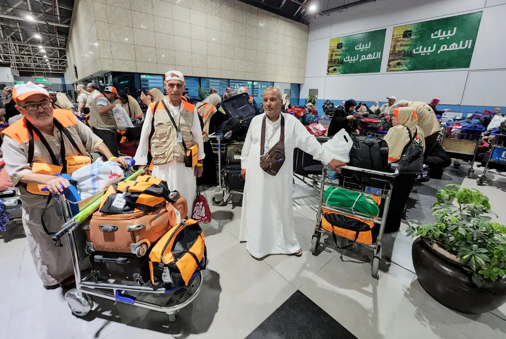22 June 2022, Egypt, Cairo: Palestinian Muslim pilgrims arrive at Cairo International Airport as they prepare to go for their pilgrimage to Mecca, as pilgrims wait to cross into Egypt on their way to Saudi Arabia for the annual Hajj pilgrimage. The Hajj, largest annual pilgrimage in the world, is the fifth pillar of Islam, a religious duty that must be carried out at least once in the lifetime of every able-bodied Muslim who can afford to do so. Photo: Ashraf Amra/APA Images via ZUMA Press Wire/dpa.