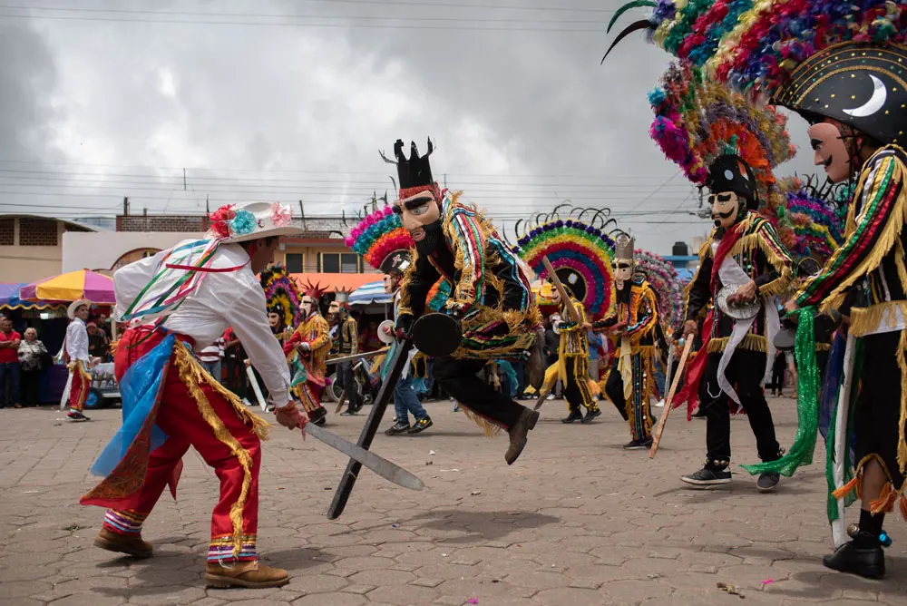 29 June 2022, Mexico, Chiconquiaco: Traditional dancers perform the Santiagos dance during a parade on Saint Peter and Saint Paul Day. Photo: Hector Adolfo Quintanar Perez/ZUMA Press Wire/dpa.