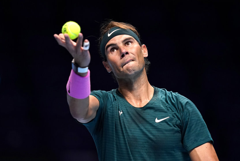 FILED - 15 November 2020, United Kingdom, London: Spanish tennis player Rafael Nadal in action against Russia's Andrey Rublev during day one of the Nitto ATP Finals at The O2 Arena, London. Rafael Nadal has tested positive for coronavirus in a development that could throw his Australian Open participation further into doubt. Photo: John Walton/PA Wire/dpa.