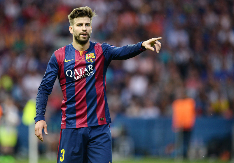 FILED - 06 June 2015, Berlin: Barcelona's Gerard Pique gestures during the UEFA Champions League final soccer match between Juventus FC and FC Barcelona at Olympiastadion in Berlin. Barcelona defender Gerard Pique has published details of his salary on Twitter after a prominent Spanish journalist suggested he and team-mates were earning significantly more at the financially stricken club. Photo: picture alliance / dpa.