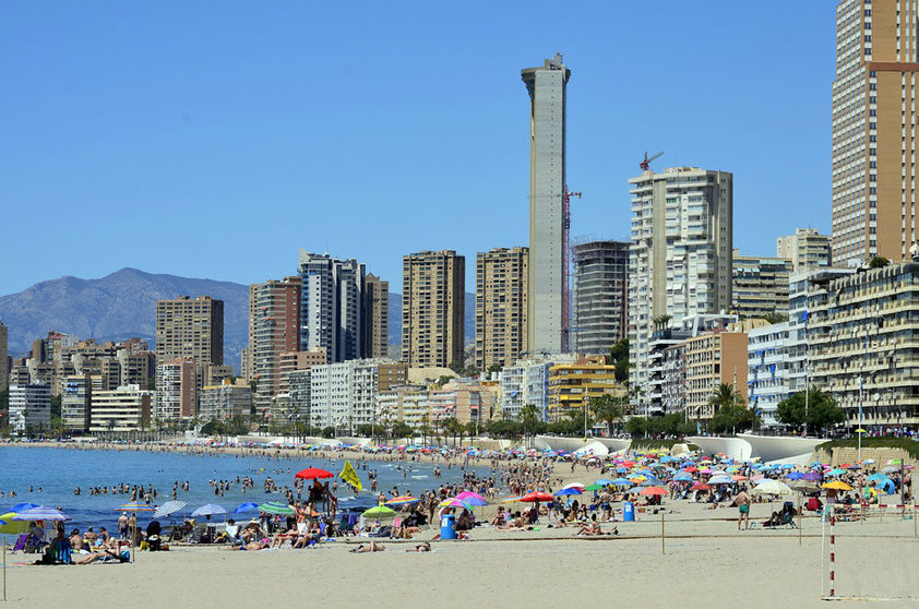 A general view of Benidorm, with its beach full of people. Photo: Pixabay.