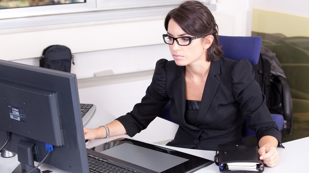 Woman work office computer black dress