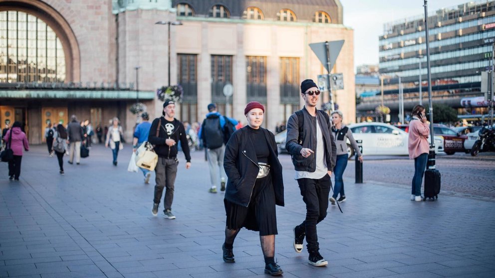 People passing in front of Helsinki central train station. Photo: Julia Kivela/Visit Finland.