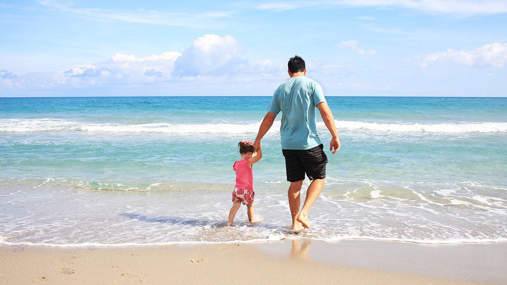 Father-daughter-beach-holiday-man-girl
