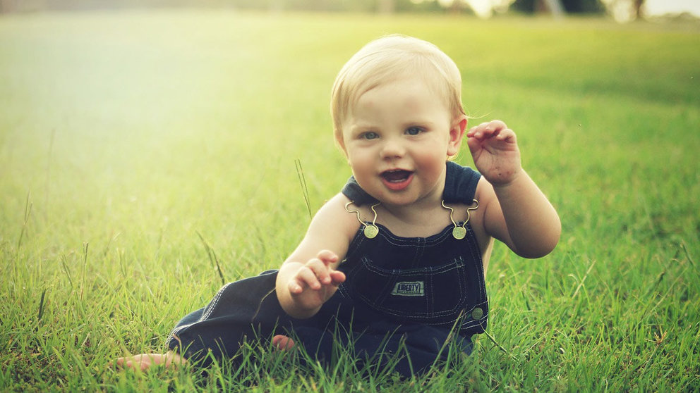 Baby-boy-grass-play