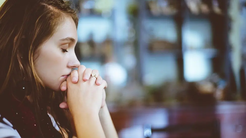 Woman-wait-pray-eyes-closed-girl