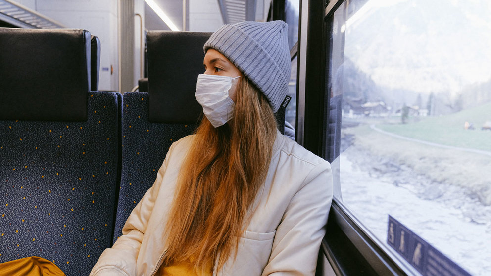 Woman-mask-train-coronavirus-flu-influenza-sick-ill