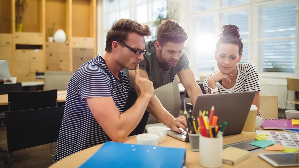 Woman-men-work-laptop-table-computer