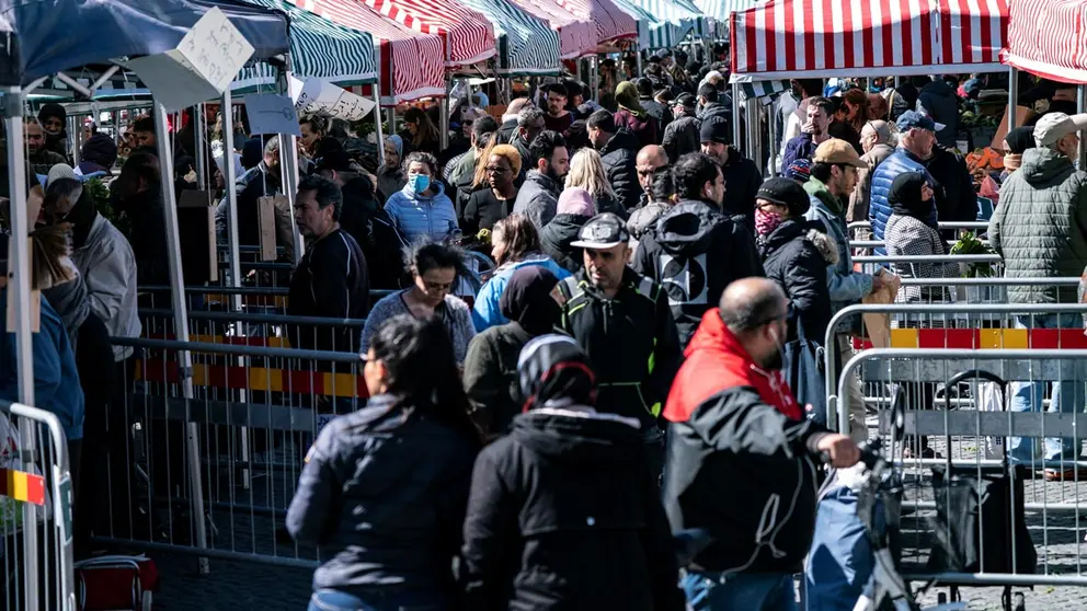 People buy vegetables as the fences and information signs are placed to reduce congestion due to the coronavirus disease (COVID-19) in Mollevangstorget, in Malmo, Sweden April 25, 2020 TT News Agency/Johan Nilsson via REUTERS