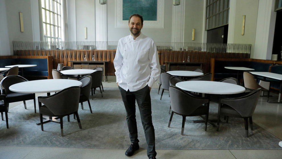 Chef and owner Daniel Humm poses for a portrait in the shuttered dining room of Michelin starred restaurant Eleven Madison Park as the outbreak of the coronavirus disease (COVID19) continues in the Manhattan borough of New York, U.S., May 20, 2020. Picture taken May 20, 2020. REUTERS/Lucas Jackson