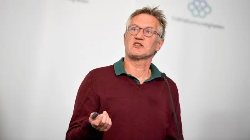 FILE PHOTO: Anders Tegnell, the state epidemiologist of the Public Health Agency of Sweden speaks during a news conference about the daily update on the coronavirus disease (COVID-19) situation, in Stockholm, Sweden May 27, 2020. Pontus Lundahl/TT News Agency/via REUTERS