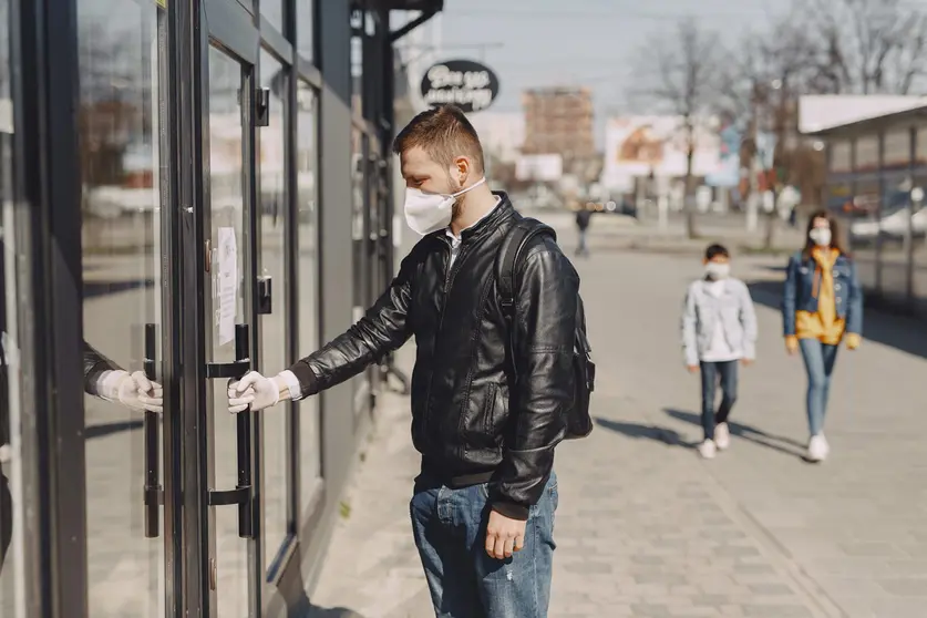 Man-mask-gloves-shop-street